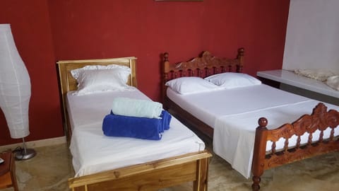 Double or Twin Room | Minibar, iron/ironing board, bed sheets