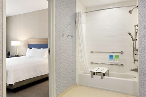 Studio, 1 King Bed, Accessible, Bathtub (Mobility & Hearing) | Bathroom | Combined shower/tub, free toiletries, hair dryer, towels