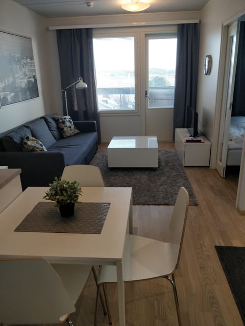 Apartment, Sauna | Living area | Flat-screen TV