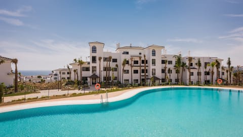 2 outdoor pools, sun loungers