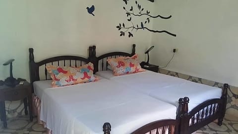 Standard Double or Twin Room, 2 Twin Beds, Garden View | 1 bedroom, in-room safe, individually decorated, individually furnished