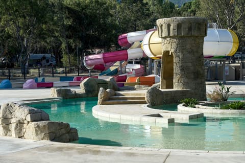 Seasonal outdoor pool, open 9:00 AM to 8:00 PM, pool umbrellas