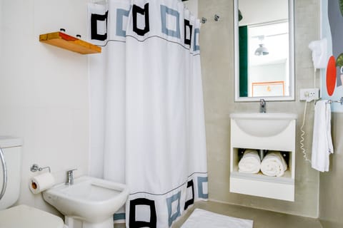 Shower, rainfall showerhead, towels