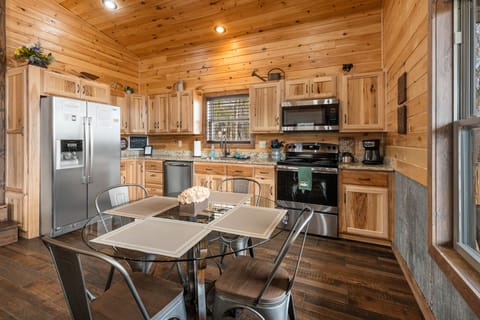 Kitchen: stainless full size fridge, electric range, dishwasher, dishwasher