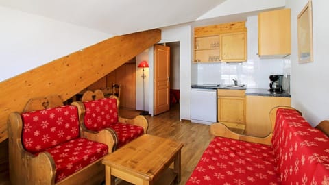 Kick back your feet and relax in the cozy living area.