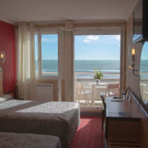 Superior Triple Room, Sea View | Minibar, in-room safe, desk, soundproofing