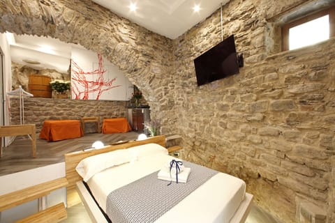 Family Room | Down comforters, memory foam beds, in-room safe, blackout drapes