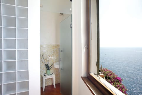 Shower, rainfall showerhead, eco-friendly toiletries, hair dryer