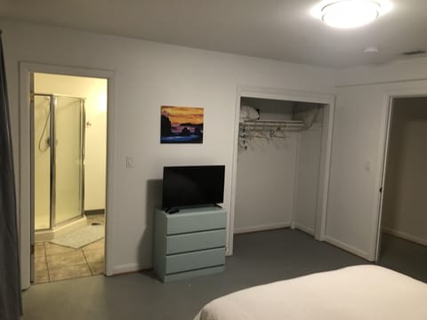 Entrance to bathroom 
Closet
Dresser and tv