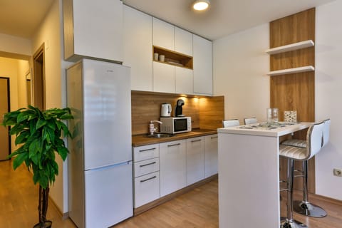 Full-size fridge, microwave, stovetop, espresso maker