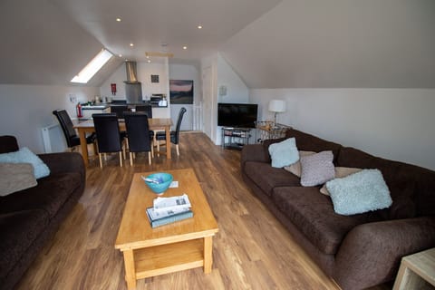 lounge, dining and kitchen from french windows