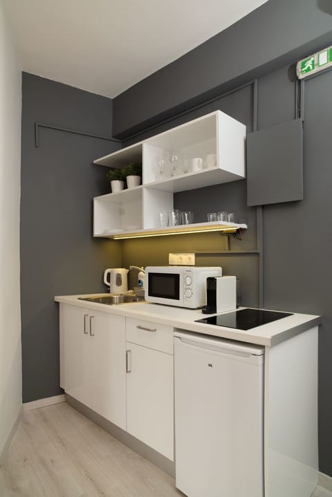 Apartment (Poseidon) | Private kitchenette | Fridge, microwave, stovetop, coffee/tea maker