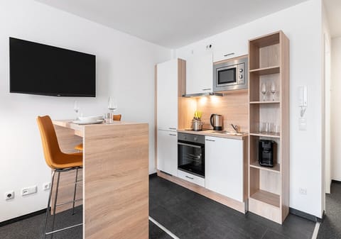 Studio-Apartment (3 Adults) | Private kitchen | Fridge, microwave, oven, stovetop