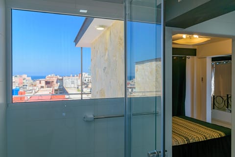 Exclusive Apartment, Terrace | Bathroom | Combined shower/tub, rainfall showerhead, free toiletries, hair dryer