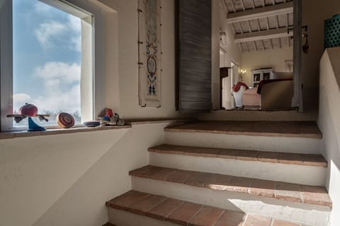Staircase to first floor living room and two bedrooms 