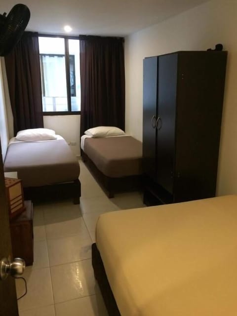 Triple Room, Non Smoking | Iron/ironing board, free WiFi, bed sheets