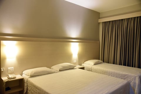 Superior Triple Room | Pillowtop beds, minibar, in-room safe, desk