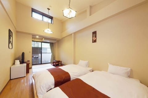 Japanese Style Twin Room, Non Smoking, Open-air Bath | In-room safe, free WiFi, bed sheets