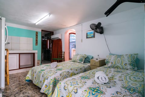 Comfort Suite, Multiple Beds, Courtyard View | Individually furnished, blackout drapes, WiFi, bed sheets