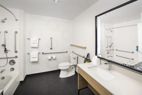 Studio, 1 King Bed, Accessible, Bathtub (Mobility & Hearing) | Bathroom | Hydromassage showerhead, designer toiletries, hair dryer, towels