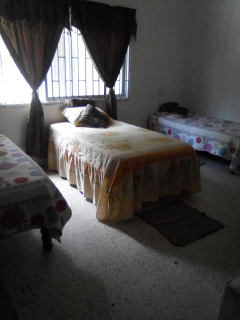 Triple Room, Multiple Beds | Blackout drapes, iron/ironing board, free cribs/infant beds, bed sheets