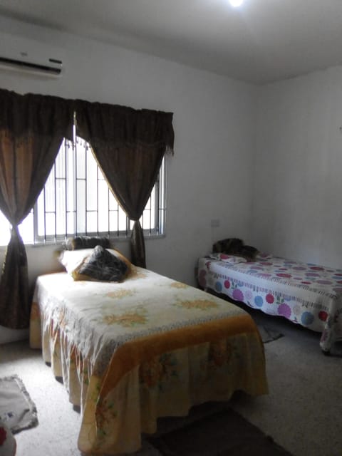 Triple Room, Multiple Beds | Blackout drapes, iron/ironing board, free cribs/infant beds, bed sheets