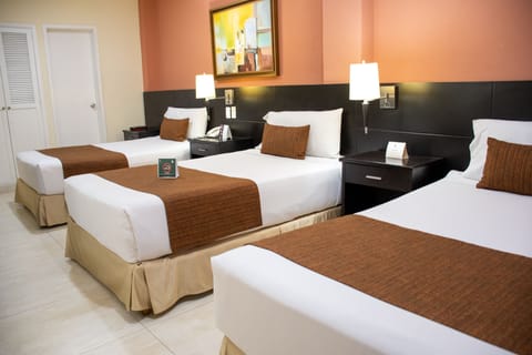 Triple Room | Premium bedding, minibar, in-room safe, individually decorated