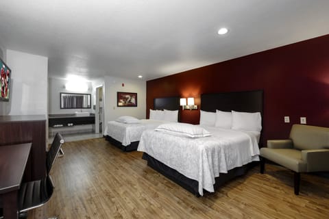 Premium Room, 2 Queen Beds (Upgraded Bedding & Snack, Smoke Free) | Desk, laptop workspace, blackout drapes, iron/ironing board