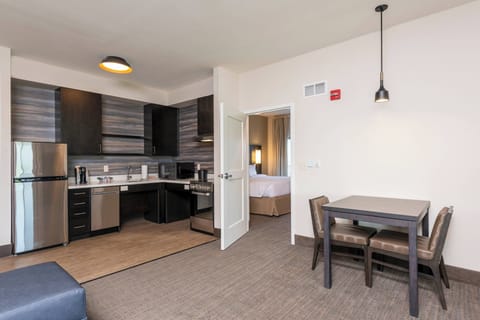 Suite, 1 Bedroom | Desk, iron/ironing board, free WiFi, bed sheets