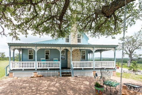 A lovely wraparound porch greets you upon arrival