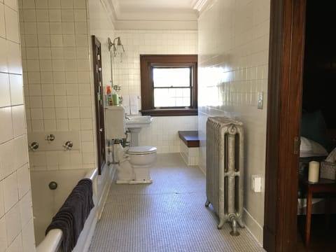 WG Irwin Suite | Bathroom | Combined shower/tub, designer toiletries, hair dryer, bathrobes
