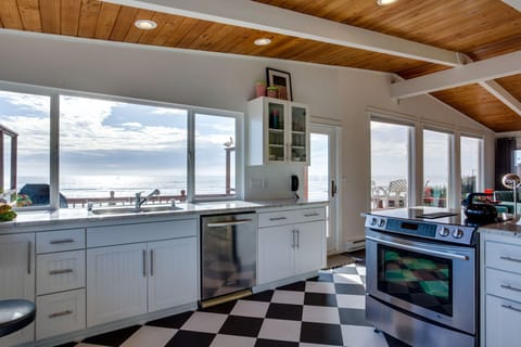 Nicely equipped kitchen is perfect for preparing meals.