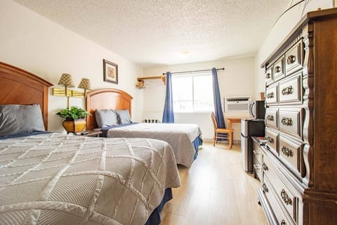 Deluxe Room, 2 Queen Beds, Mountain View | Premium bedding, individually decorated, individually furnished