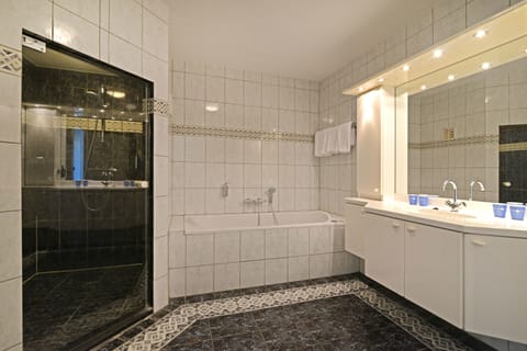 Suite, Terrace, Sea View | Bathroom | Combined shower/tub, eco-friendly toiletries, hair dryer, towels