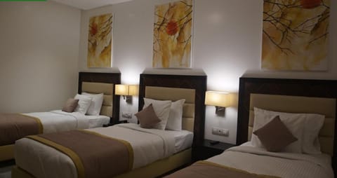 Triple Room | Premium bedding, Select Comfort beds, minibar, in-room safe