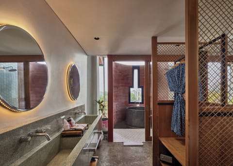 Separate tub and shower, deep soaking tub, bathrobes, slippers