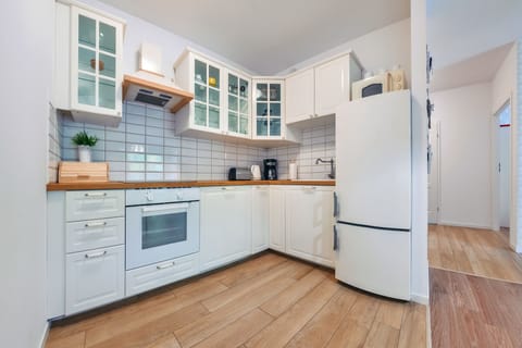 Apartment (Armii Krajowej 133A/14) | Private kitchenette | Fridge, oven, dishwasher, electric kettle