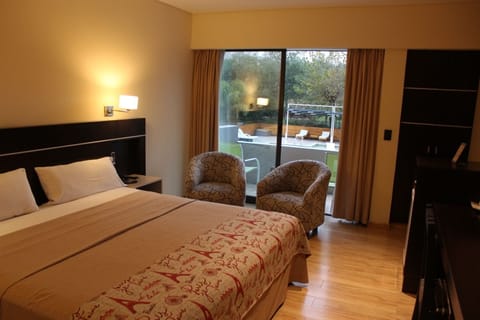 Standard Double Room | Free minibar items, in-room safe, blackout drapes, iron/ironing board