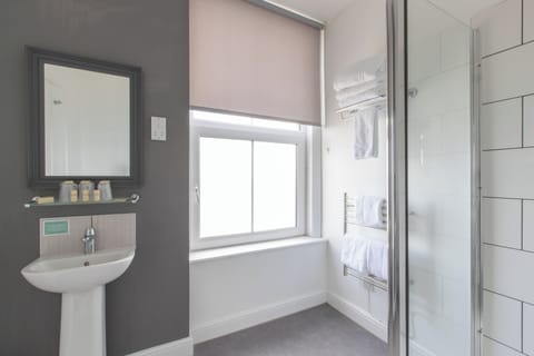 Twin Room, Sea View | Bathroom | Combined shower/tub, hair dryer, soap, toilet paper