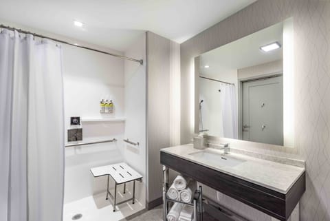 Suite, 1 King Bed, Accessible (Communication, Roll-In Shower) | Bathroom | Combined shower/tub, free toiletries, hair dryer, towels