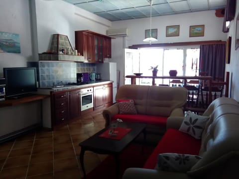 Apartment, Sea View (1) | Living area | Flat-screen TV