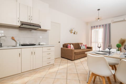 Superior Apartment | Private kitchen | Fridge, electric kettle, toaster, dining tables