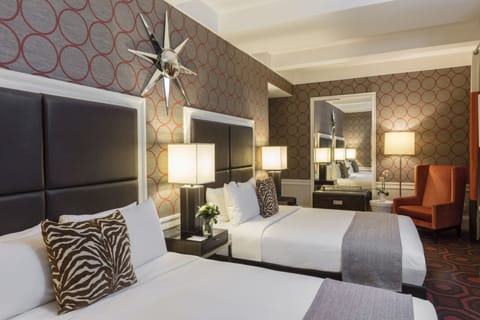 Premium bedding, in-room safe, individually decorated