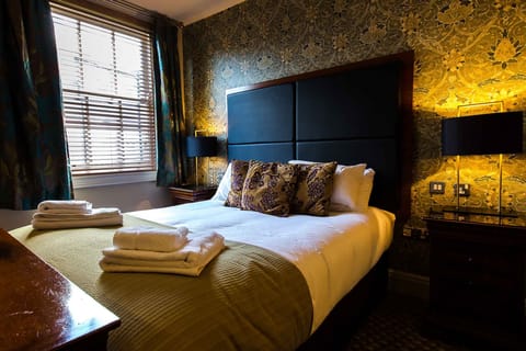 Deluxe Double Room | Select Comfort beds, desk, laptop workspace, iron/ironing board