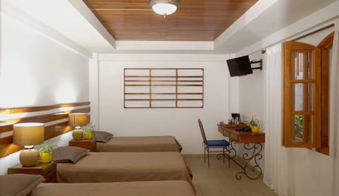 Standard Triple Room | Down comforters, Tempur-Pedic beds, in-room safe, desk