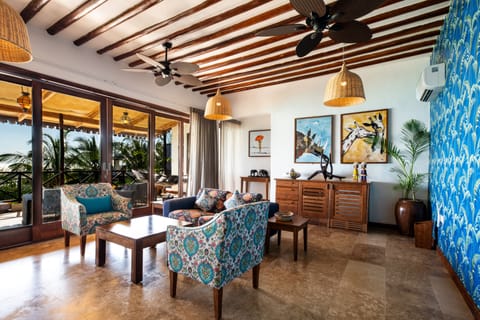 Luxury Suite, 1 Bedroom, Balcony, Ocean View | Living area | 20-inch flat-screen TV with satellite channels, TV