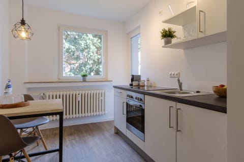 Premium Apartment, Balcony, Garden View (EUR 75,00 Cleaning Fee) | Private kitchen | Microwave, oven, stovetop, coffee/tea maker