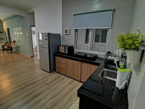 Family Apartment, 3 Bedrooms | Private kitchen | Full-size fridge, microwave, stovetop, cookware/dishes/utensils