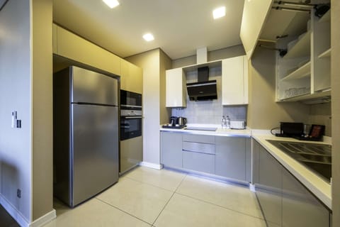 Apartment, 2 bedrooms | Private kitchenette | Fridge, microwave, oven, stovetop