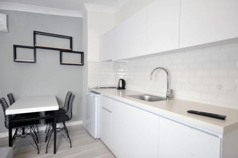 Deluxe Studio | Private kitchenette | Mini-fridge, electric kettle